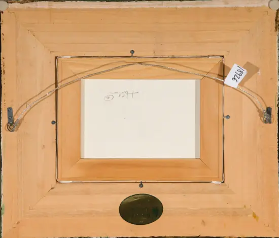 Back of an orange wooden frame with a wire hanger, metal brackets on the sides, and a white inner canvas; a tag with a number is attached.
