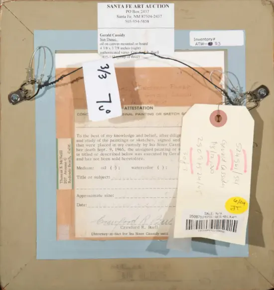 Back of a framed painting with hanging wire, auction labels, tag notes, and paper documents attached.