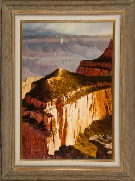 Oil painting of a canyon with sunlit orange cliffs and distant layered rock formations, framed in wood.