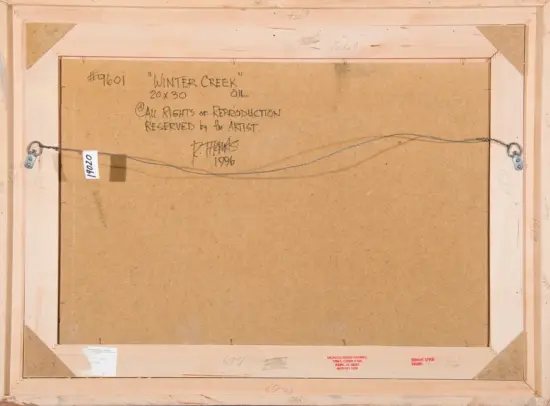 Back of a framed canvas showing a hanging wire, with handwritten notes on the brown backside: title 'Winter Creek' (oil), size 20x30, 'All rights of reproduction reserved by the artist', signed 'D. Hawkins 1996'. The frame has corner protectors and labels along the edges.