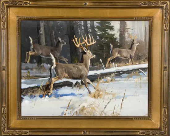 Oil painting of a snowy forest with three deer; a buck with large antlers leads as others run nearby, in a gold ornate frame.