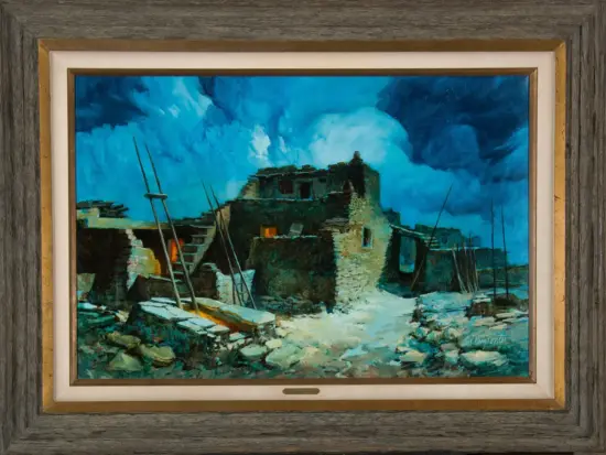 Framed painting of a crumbling stone ruin amid rubble under a vivid blue sky, with a rustic wooden frame.