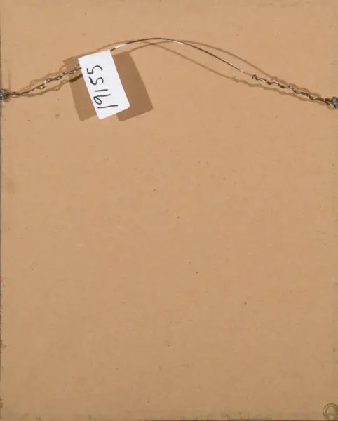 Close-up of a twisted metal necklace laid on brown cardboard with a small white tag attached, showing handwritten numbers.