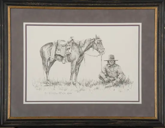 Pencil sketch of a cowboy sitting on grass beside a horse with a rope between them, framed as wall art