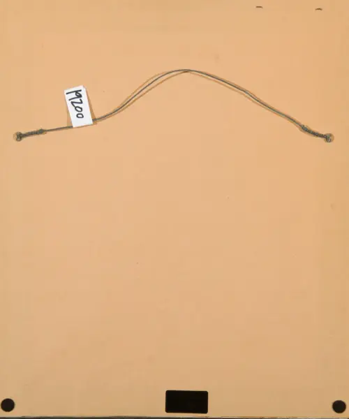 Curved metal wire with looped ends and a tag labeled '1970'.