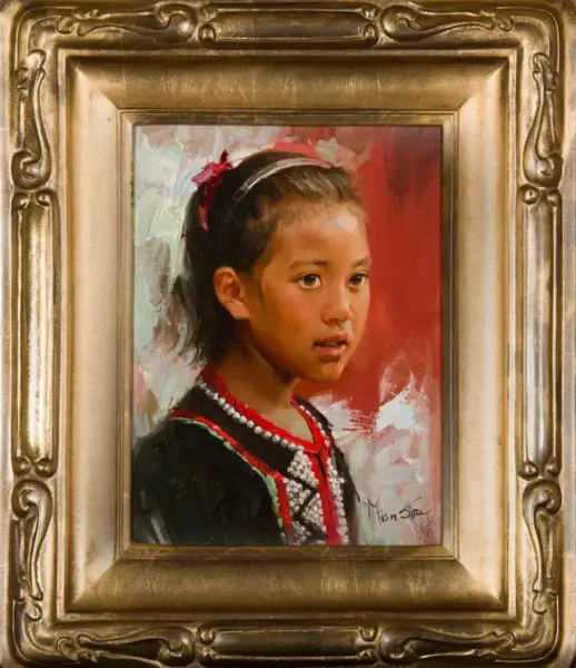 Portrait of a young girl with dark hair tied back with a red ribbon, wearing a black outfit with red and white embroidery, in an ornate gold frame.