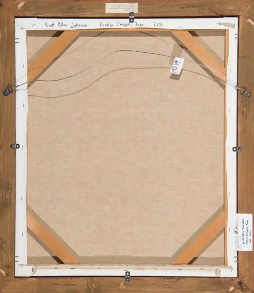 Back of a stretched canvas frame with hanging wire, labels, and wooden braces visible; artwork ready to hang.