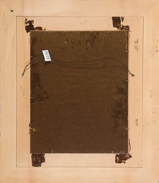 Back of a framed artwork showing a brown backing board, hanging wires, and a small white tag with numbers attached to the left side of the frame.