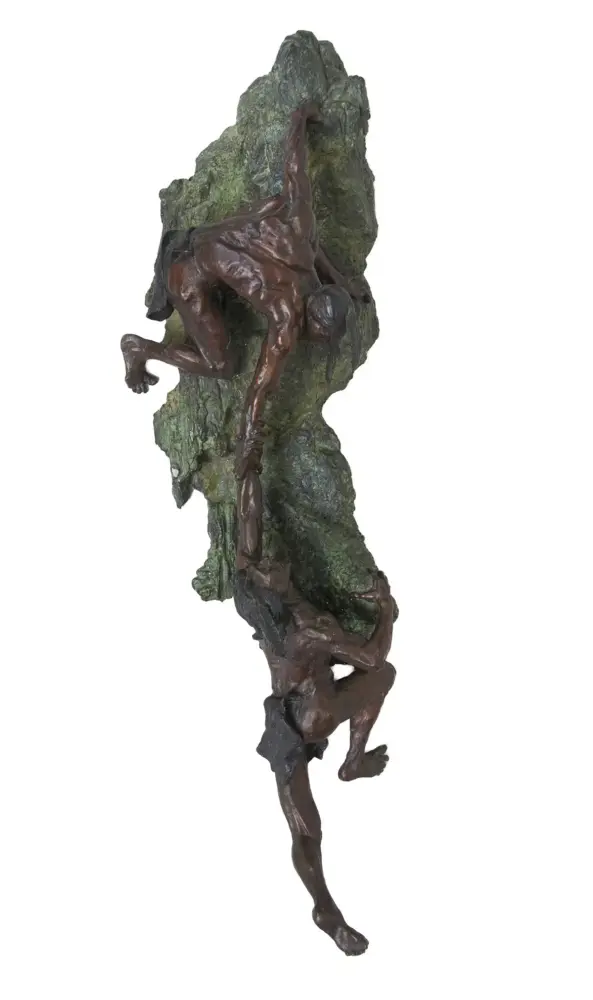 Bronze sculpture of a muscular climber gripping a jagged rock as he ascends.