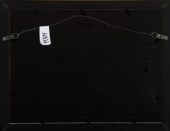 Back of a black picture frame with a metal hanging wire across the top and a white tag bearing a handwritten number attached to the wire.