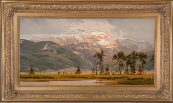 Framed landscape painting of snow-capped mountains, a grassy valley with tipis, and a river in the foreground.