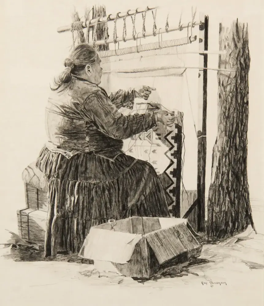 Woman in a long dress sits on a bench weaving on a loom outdoors, with yarns overhead and a patterned textile.
