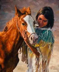 A girl in a fringed turquoise dress gently holding a brown horse with a white blaze on its face.