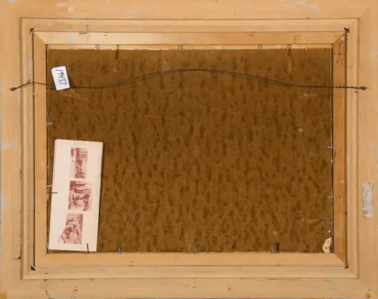 Back of a framed painting: brown fabric backing, a hanging wire across the top, wooden stretcher frame, and small labels on the sides with a photo strip taped on the lower left.