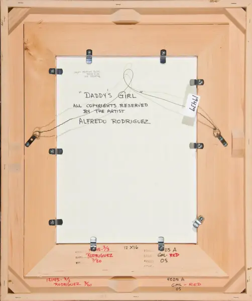 Back of a wooden-framed painting; title 'Daddy's Girl', artist Alfredo Rodriguez, copyright reserved; hanging wires and clamps visible on the frame.
