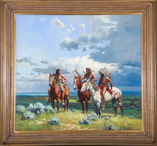Three Indigenous men on horseback ride across a grassy plain under a cloudy blue sky.