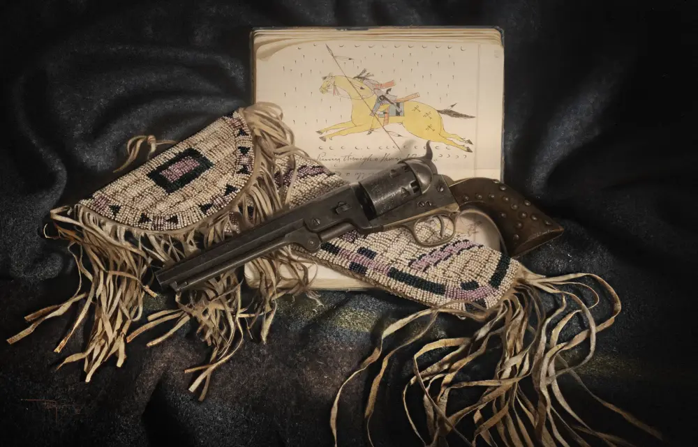 Open old book showing a drawing of a rider on a yellow horse, with a long rifle laid across beaded fringed fabric on a dark background.