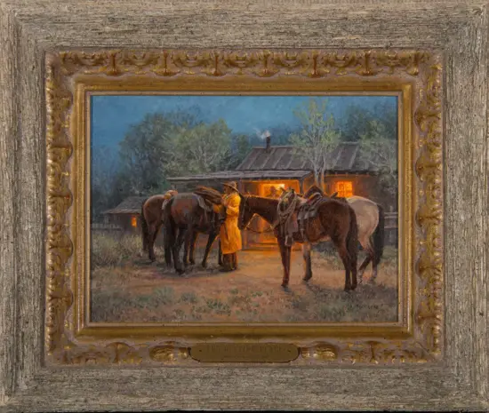Framed painting of several horses tied outside a warmly lit cabin at night, in a rustic ornate frame.