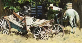 Old man in a wide-brim hat standing beside a white horse hitched to a wooden cart loaded with rough-cut planks and logs in a rural scene.