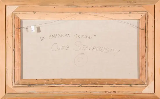 Back of a stretched canvas: handwritten label reads “An American Original” with a signature, Oleg Stavrovsky, on light canvas framed by wooden stretcher bars.