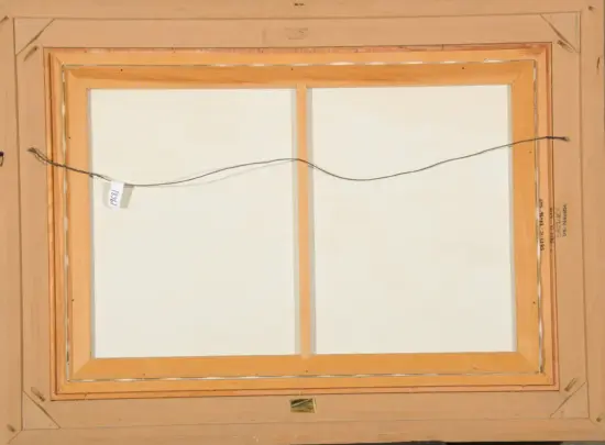 Back of a rectangular wooden frame with a horizontal hanging wire and small labels on the right side, for wall mounting.