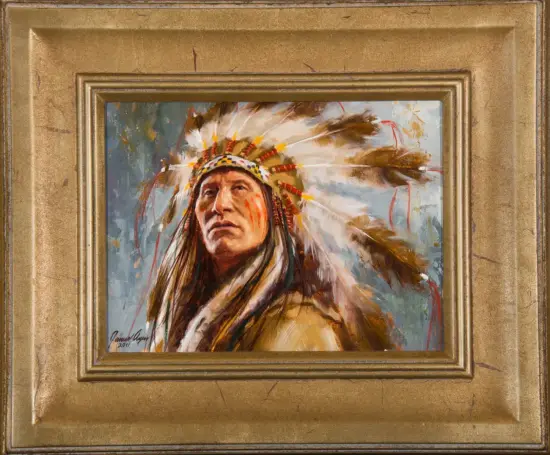 Portrait of a Native American man in a feathered headdress, looking pensively to the left, framed by a gold ornate frame.