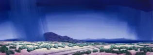 Desert scene with railroad tracks and low shrubs under a towering blue storm cloud and rainfall curtain.