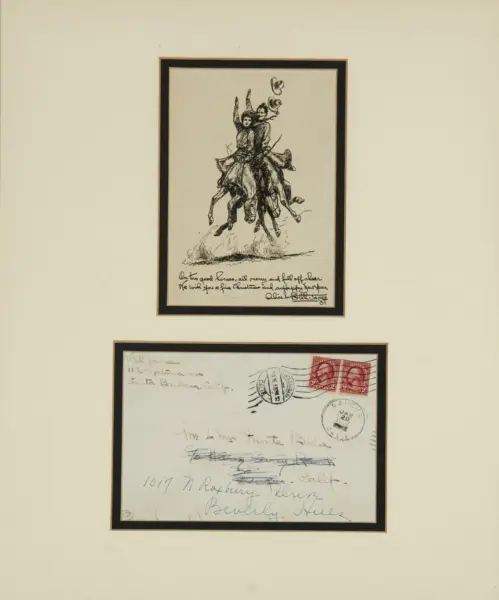 Framed black‑and‑white sketch of two riders on a horse with raised arms, mounted on a beige gallery wall.
