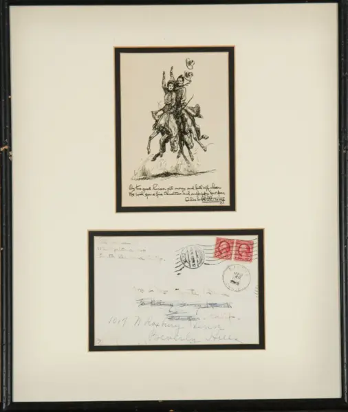 Framed display with a top sketch of people celebrating on a hill and a bottom envelope with stamps framed beneath it.