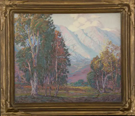 Oil painting of a forest opening toward a distant pastel-colored mountain range, set in an ornate gold frame.