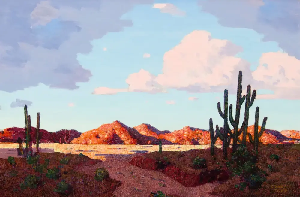 Desert landscape painting with tall cacti, red rocky hills, and a bright blue sky with fluffy clouds.
