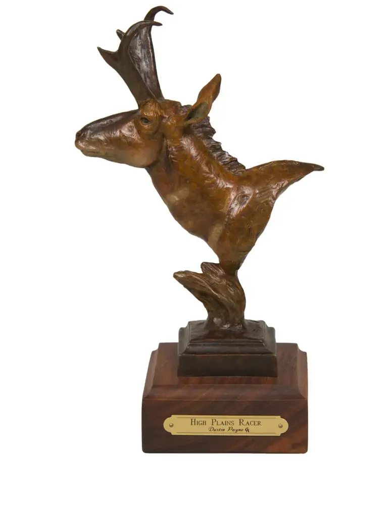 Bronze statue of a rearing horse on a wooden base, plaque reads High Plains Racer, Dustin Payne.