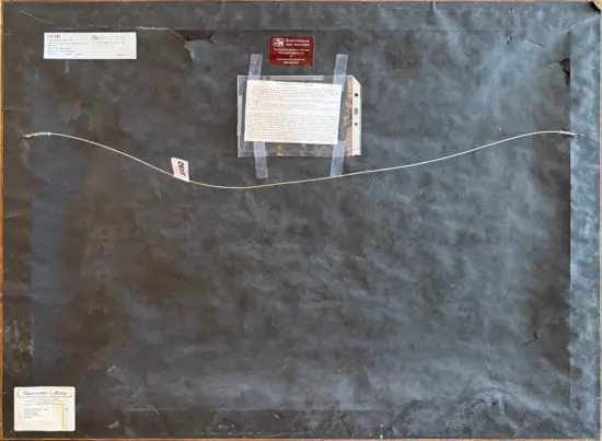Reverse view of a framed artwork with taped labels, paper documents, and a long hanging wire across the back; small gallery stickers are visible in corners.