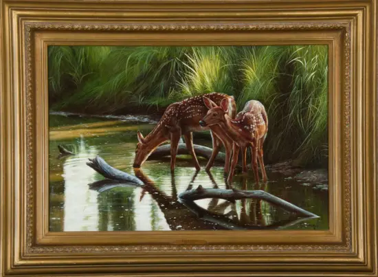 Framed painting of two fawns drinking at a shallow pond among tall green grasses.