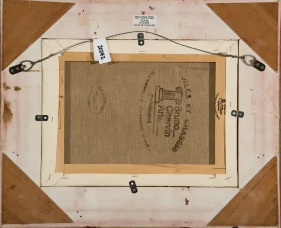 Back of framed canvas showing hanging wire, metal eye hooks, and wooden stretcher bars; canvas has stamps and markings on the reverse side.